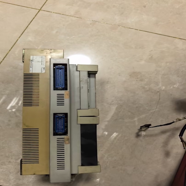 Komori PLC